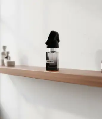 Sadonaso perfume bottle with bold artistic cap